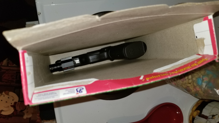 Gun in Cereal Box