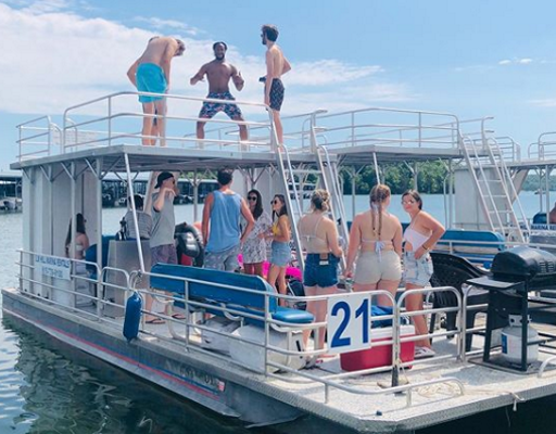 Chris Perrine on pontoon boat (Source Instagram)