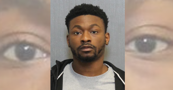 Man punches ex-girlfriend, drags her by the hair in front of their children