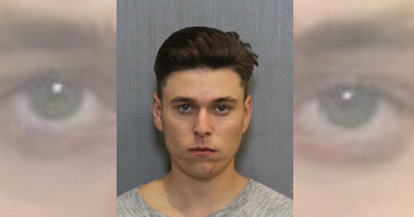 Teen bites girlfriend several times while she bakes cookies for his birthday