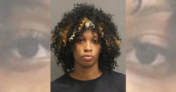 Woman charged with stolen firearm she claims was given to her by a family member