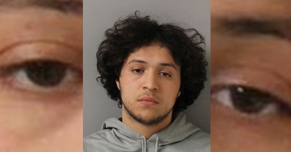 Underage man charged for possessing gun and open bottle of liquor during traffic stop