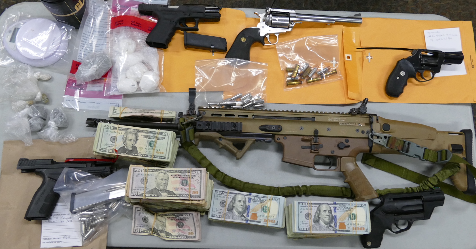 1 Arrested, 1 Wanted, in Edgehill Raid that Seized Guns, Heroin, Cocaine, & More…